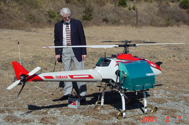 Pierre checking out a Yanmar helicopter in Japan (2001).